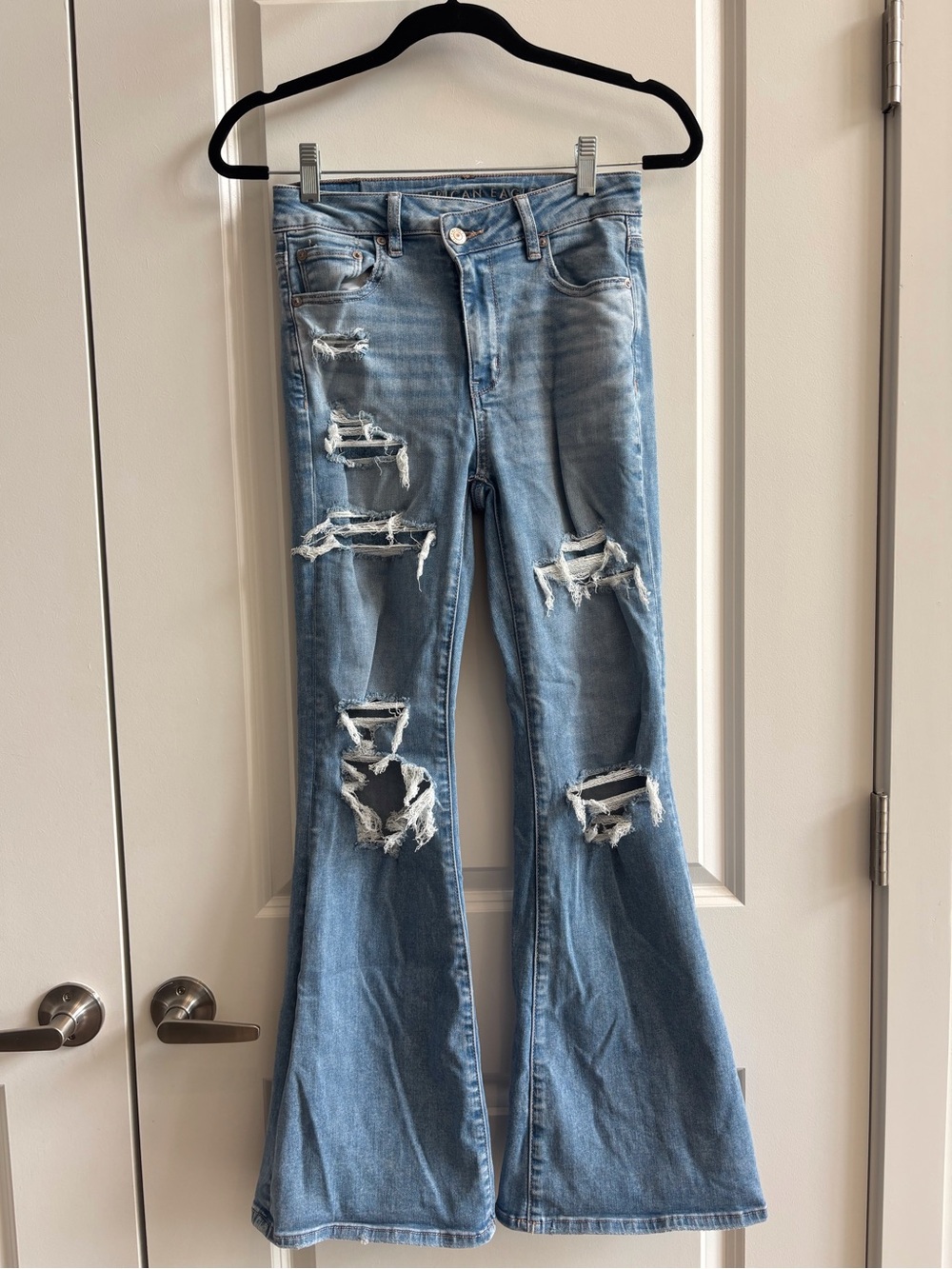 American Eagle Outfitters Medium Wash Aysmmetrical Distressed Flare Jeans